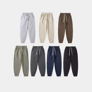 Men’s Solid Color Slim-fit Sweatpants with Elastic Cuffs and Zipper Details Available in Multiple Colors