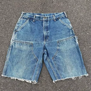 OEM ODM Custom Eco Baggy Double Knee Jeans Shorts Denim Oversize Distressed Raw Hem Cut Edge Cargo Jorts For Men