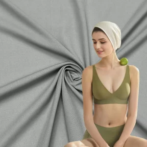 Recycling Seamless Bra 57% Polyamide 43% Elastane Fabric Plain Interlock Weft Knitted Nylon Spandex Fabric for Underwear