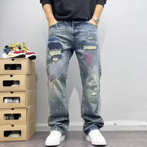 Retro Ripped Jeans Men’s Slim Straight Trousers Featuring Custom Embroidery and Distressed Patchwork